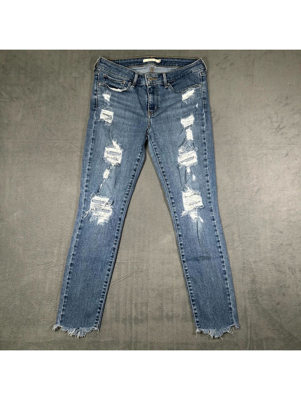 Levi's 711 Jeans Womens 28x28 Medium Wash Denim Skinny Distressed Raw Hem Ripped